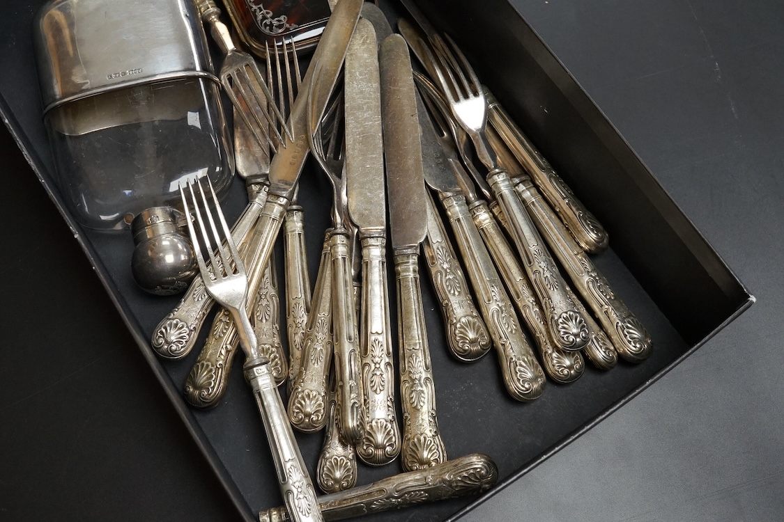 A late Victorian silver mounted glass hip flask, James Dixon & Sons, Sheffield, 1891, 15.5cm (lead solder), together with a silver mounted glass inkwell, assorted silver handled plated dessert eaters(a.f.) and a tortoise